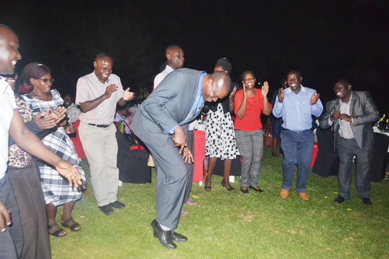 The University Bursar Mr. Augustine Tamale pulling his strokes amidst cheer.