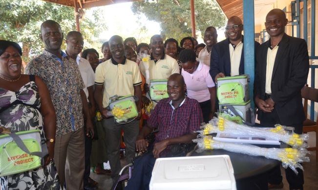 DIVERSE Project PI-Assoc. Prof. Donald Rugira Kugonza (2nd R) with officials and trainees during the kit distribution exercise in Mpigi District