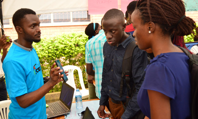 A student demonstrates a Phone App during the 7th CEDAT Open Day October 2017.