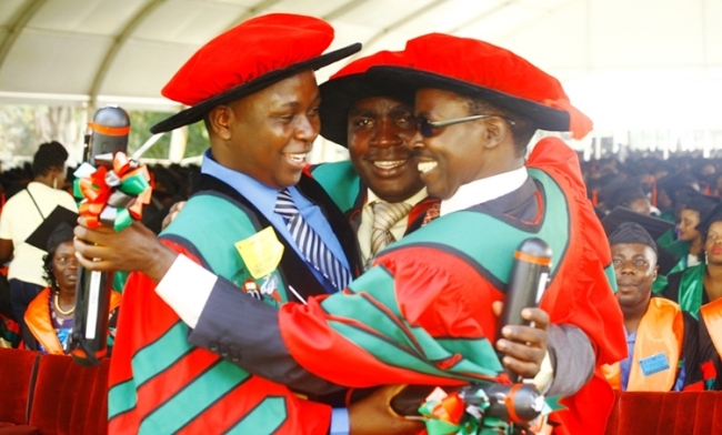 PhD Graduates Dr. Gabriel Karubanga, Dr. Ssebagala Lusiba and Dr. Narisi Mubangizi celebrating on Day1 of the 68th Graduation Ceremony, 16th January 2018, Makerere University, Kampala Uganda