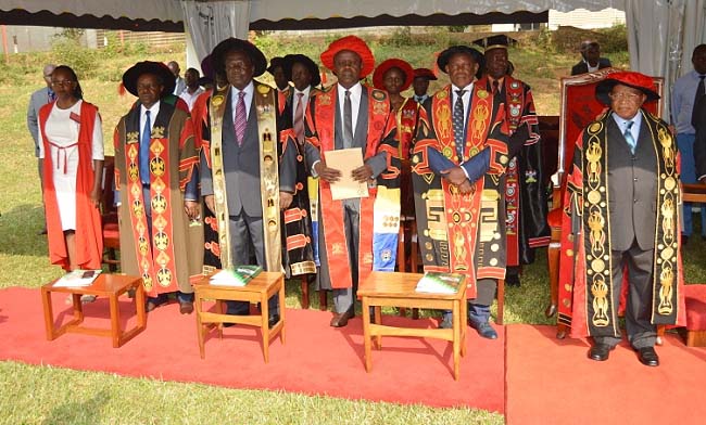 R-L: Chancellor-Prof. Ezra Suruma, Vice Chancellor-Prof. Barnabas Nawangwe, Principal MUBS-Prof. Wasswa Balunywa, Chair Council-Eng. Dr. Charles Wana-Etyem, DVCFA-Prof. William Bazeyo and the Mace Bearer from MUBS at the third session of the 68th Graduation Ceremony, 18th January 2018, Freedom Square, Makerere University, Kampala Uganda