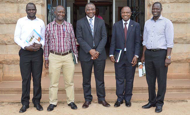 Prof. Aondover Tarhule (C) and Assoc. Prof. Eria Hisali (2nd R) flanked by L-R: Mr. Charles Ssemugabi, Assoc. Prof. Yazidhi Bamutaze and Mr. John Bosco Oryema (R) after the presentation on Binghamton University, 7th March 2018, Makerere University, Kampala Uganda. Makerere and Binghamton have both prioritised Internationalisation as a key focus area in the coming decade.