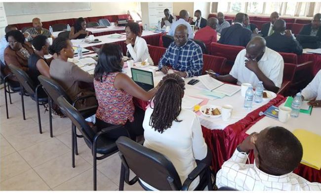 Various stakeholders consult during the workshop to come up with the draft MSc. E-government Services and Technology curriculum, 15th February 2018, CoCIS, Makerere University, Kampala Uganda