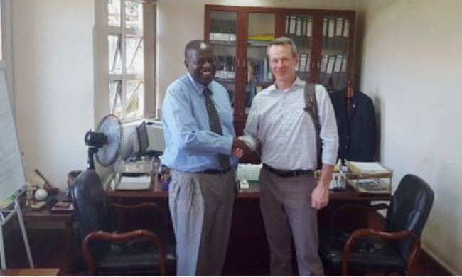 Principal CoCIS-Prof. Tonny Oyana (L) shakes hands with Big Ideas Manager, UC Berkeley-Mr. Phillip Denny during his visit on 13th February 2018, CoCIS, Makerere University, Kampala Uganda