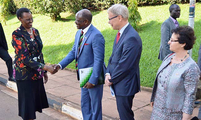 The First Lady and Minister of Education and Sports-Hon. Janet Kataaha Museveni (L) is met upon arrival for the Mak-Sida Research Annual Planning Meeting by Vice Chancellor-Prof. Barnabas Nawangwe (2nd L), Swedish Ambassador-H.E. Per Lindgärde (2nd R) and 1st Secretary, Dr. Gity Behravan (R) on 23rd April 2018, Makerere University, Kampala Uganda