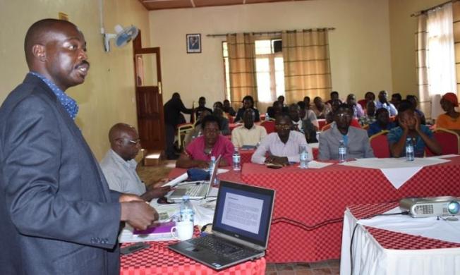 The Project Principal Investigator, Dr. Joshua Wanyama makes a presentation to stakeholders during the workshop held on 22nd May 2018 to mark the end of the project, KonTIK Hotel, Hoima, Uganda