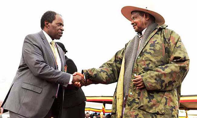 H.E. President Yoweri Kaguta Museveni (R) congratulates Prof. William Bazeyo (L) after his Golden Jubilee Award Medal decoration during International Labour Day Celebrations, 1st May 2018, Sembabule District, Uganda. Image:New Vision