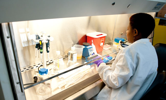 A student in a Molecular Laboratory at Makerere University