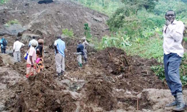 Desperate residents ponder the next move following a landslide in Bududa District, Eastern Uganda. Image:RAN