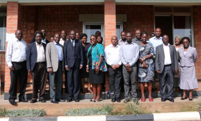 The DVCAA-Dr. Ernest Okello Ogwang (4th L) and Deputy Principal CHUSS-Dr. Josephine Ahikire (5th L) flanked by Deans and participants in the College's Graduate Management Retooling Seminar, 21st June 2018, Kolping Hotel, Kampala Uganda