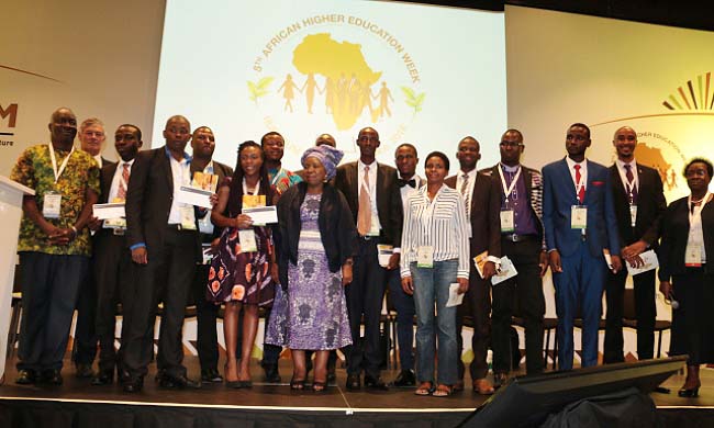 The 2016 RUFORUM Young Innovators after receiving their awards in Cape Town, South Africa, with former AU Comission Chairperson-Nkosazana Clarice Dlamini-Zuma (C) and Executuve Secretary-Prof. Adipala Ekwamu (L). Image:RUFORUM