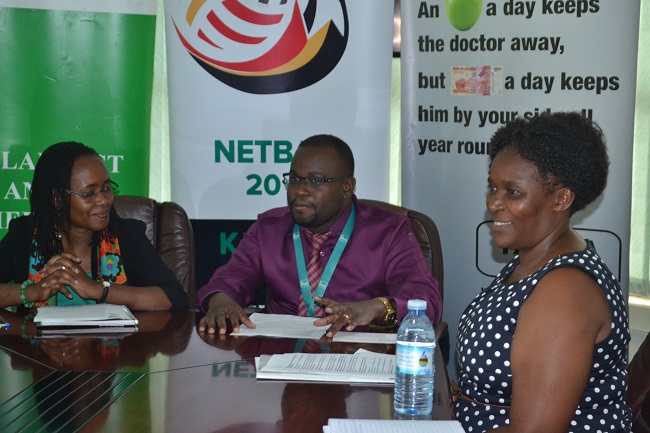 L-R, Dr. Sarah Ssali, Mr. Aurthur Esimat and Ms. Peninnah Kabenge during a press conference at IAA Healthcare Offices.