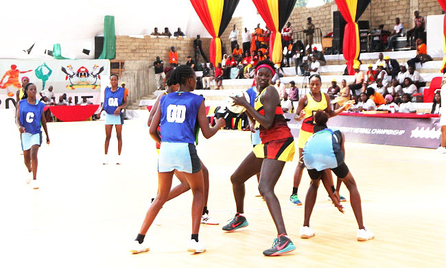 Uganda's Mary Nuba (with ball) in action during Game 5 of the 3rd FISU WUNC against Kenya on Day2, 18th September 2018. Uganda won the tie 105-15 and later beat Singapore 77-19 in Game 8, Indoor Sports Facility, Makerere University, Kampala Uganda