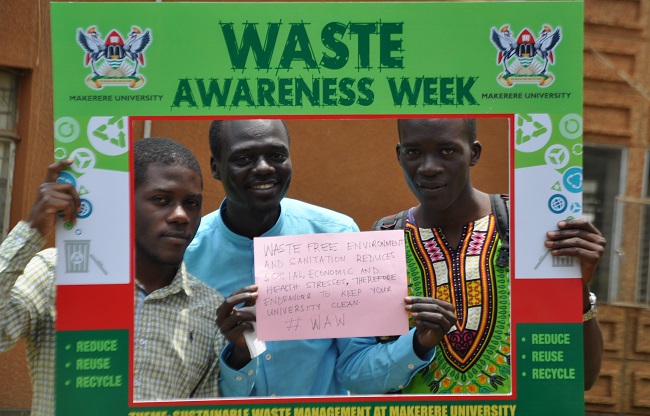 Students ready to take action during the Waste Management Awareness Week at  Makerere University.