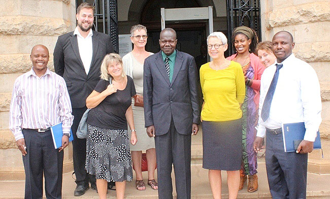 The DVCAA-Dr. Ernest Okello Ogwang (3rd R Front Row) and University of Agder's Dean, Faculty of Social Sciences-Dr Anne Halvorsen (2nd R Front Row) with staff from both institutions after the courtesy call on the Vice Chancellor, 10th October 2018, Makerere University, Kampala Uganda