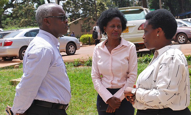 L-R: Vision Group's CEO-Mr. Robert Kabushenga and Head of Marketing and Communication-Ms. Susan Nsibirwa chat with Chairperson of the Uganda Manufacturers Association-Ms Barbara Mulwana after the 9th Pakasa Forum on 11th October 2018, CoBAMS Auditorium, Makerere University, Kampala Uganda