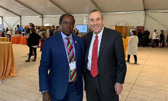 DVCFA-Prof. William Bazeyo (L) joins 29th Harvard University President-Prof. Lawrence S. Bacow for a photo moment on the sidelines of the Inaguration Ceremony, 5th October 2018, Harvard University, USA. Courtesy Photo