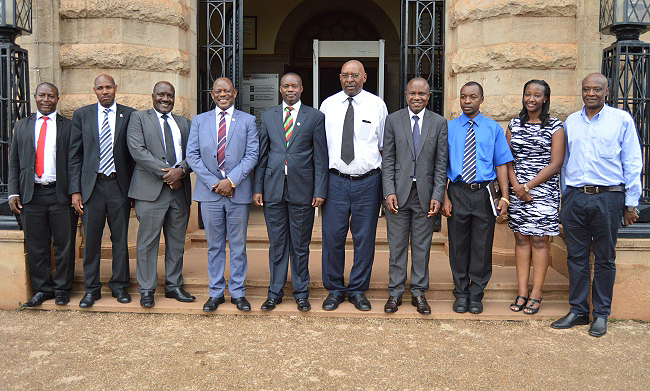 Mak Vice Chancellor Prof. Barnabas Nawangwe (4th Left), H.E.Mulenga Augustus Ceasor - Chairman Board of Trustees St Augustine International University (SAIU) (5th Left), Prof Nzarubara R. Gabriel -Vice Chancellor, SAIU (5th Right) in a group photo after signing a collaboration agreement on 30th October 2018, Makerere University, Kampala Uganda