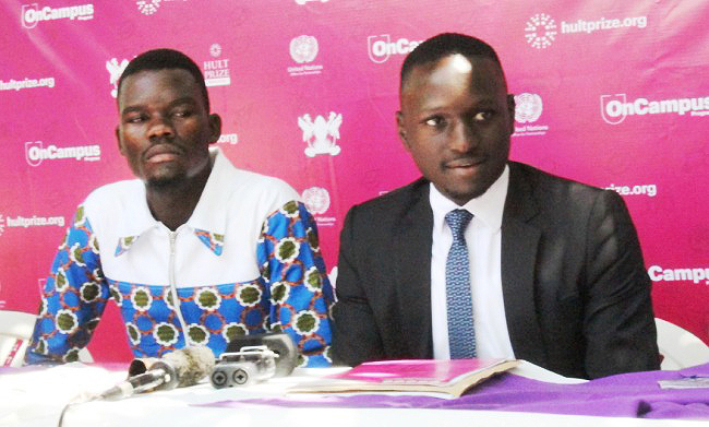 Campus Director, Hult Prize at Makerere University-Silver Walugembe (R) and the Guild Minister of ICT and Research (Left) at the Press Conference, Makerere University, Kampala Uganda