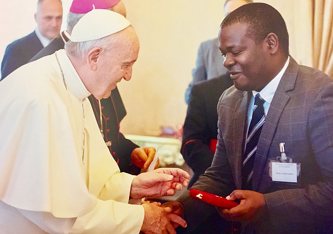 Prof. Noble Banadda (Right) receives his Pius XI Medal from His Holiness Pope Frances (Left) at the award ceremony on 12th November 2018 in the Vatican.