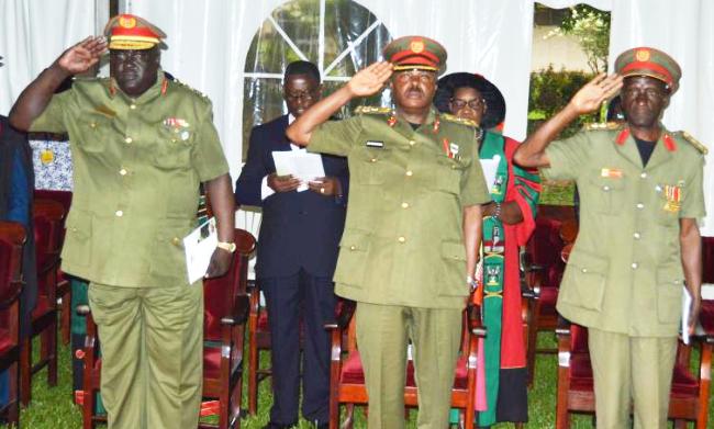 L-R: Lt. Gen. Andrew Gutti-Chairman of the General Court Martial, Brig. Jim Wills Byarugaba-UPDF Chief of Training and Recruitment and Col. Steven Atukwase-Coordinator, M.A. Defence and Security Studies Programme, Senior Command and Staff College, KIMAKA at the 69th Graduation Ceremony on 18th January 2019, Makerere University, Kampala Uganda