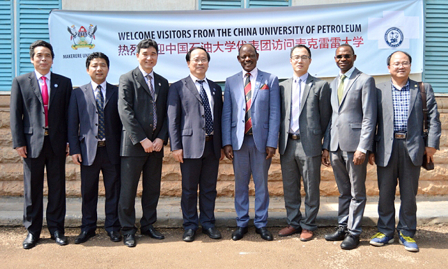 The Vice Chancellor, Prof. Barnabas Nawangwe (4th R) and the Vice President of China University of Petroleum Prof. Jun Yao (4th L) together with the DVCAA-Dr. Umar Kakumba (2nd R) and the UPC delegation after the Agreement signing on 7th January 2019, Makerere University, Kampala Uganda
