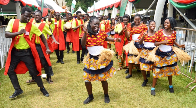 Students of Performing Arts and Film perform the Owaro Traditional Dance from Eastern Uganda as they lead the Chancellor's Procession