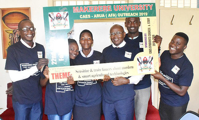 The Principal CAES, Prof. Bernard Bashaasha (3rd R) poses with a group of students at the flagoff ceremony on Thurday 21st February 2019, Makerere University, Kampala Uganda