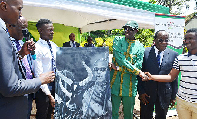 Gen. Elly Tumwine (3rd Right) receives a personal portrait developed by a Civil Engineering Student. 2nd Right is Former Electoral Commission Chairman Eng. Dr. Badru Kiggundu. The two graced the CEDAT Open Day on 26th October 2018, Makerere University, Kampala Uganda