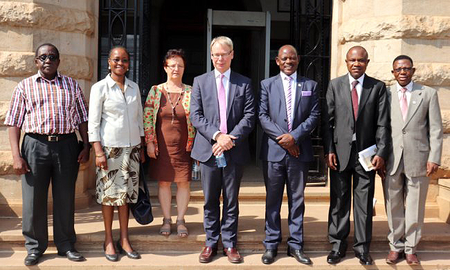 The Swedish Ambassador to Uganda-H.E. Per Lindgärde (C) and Vice Chancellor-Prof. Barnabas Nawangwe (3rd R) with L-R: Prof. John Kabasa, Dr. Sarah Ssali, Dr. Gity Behravan, Dr. Eria Hisali and Prof. Buyinza Mukadasi after a meeting to discuss sustainable funding for research on 31st January 2019, Makerere University, Kampala Uganda