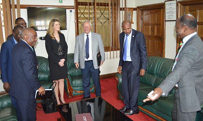 Vice Chancellor Prof. Barnabas Nawangwe(R) and the University Secretary Mr.Charles Barugahare (2nd Right) receiving Mr. Bryn Styles (3rd Right), Ms Jill Gunter (4th Right), Mr. Emmanuel Katongole(L) and others shortly before the meeting.