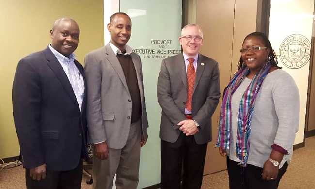 Dr. Josephine Ahikire (Right), Dr. Aaron Mushengyezi (2nd Left), Dr. Andrew State (Left) with Prof. James P. Holloway, Vice Provost for Global Engagement and Interdisciplinary Academic Affairs, University of Michigan (2nd Right).