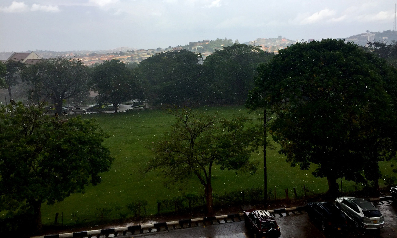 A rainy Freedom Square, Makerere University, Kampala Uganda at the onset of the rains on 4th March 2019. In the background (Right to Left) are sunlit Kololo, Naguru and Mulago hills