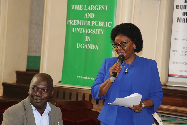 The Dean, School of Public Health and Chairperson Select Committe on Gender Equity at Mak Prof. Rhodah Wanyenze presenting the Gender Equity Report at a stakeholders validation meeting in Main Hall on 17th April 2019.