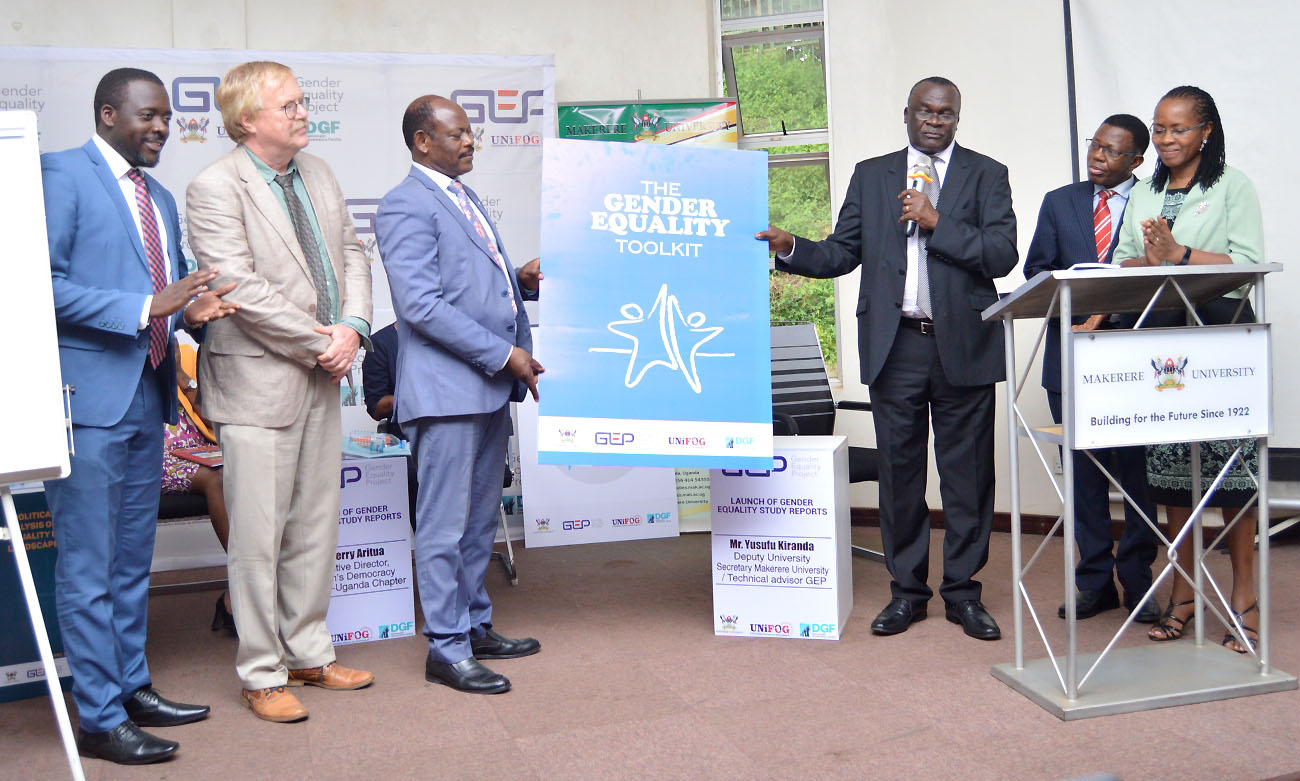 The Deputy Chief Justice Alfonse Owiny-Dollo (3rd Right) assisted by the Vice Chancellor-Prof. Barnabas Nawangwe (3rd Left) and flanked by R-L: Assoc. Prof. Sarah Ssali, Prof. Buyinza Mukadasi, Head DGF-Mr. Wim Stoffers and Mr. Yusuf Kiranda launches the Gender Equality Toolkit on 10th April 2019, SFTNB Conference Hall, Makerere University, Kampala Uganda