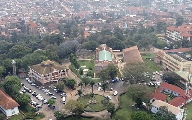 An aerial view of R-L: the School of Statistics and Planning, Departments of Chemistry and Mathematics, Colleges of Engineering-CEDAT, Natural Sciences (JICA Building)-CoNAS and Agriculture-CAES. Partly visible in the background is the surrounding Kikoni neighbourhood, October 2018, Makerere University, Kampala Uganda