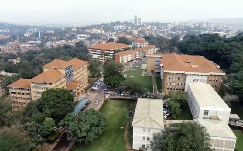An aerial photo of the Senate Building (Left), Social Sciences Building (Right), CTF1 (Mid Right), Lincoln Flats and CoCIS Blocks B and A (Centre), Makerere University and Pearl of Africa Hotel, Nakasero (Background), Kampala Uganda