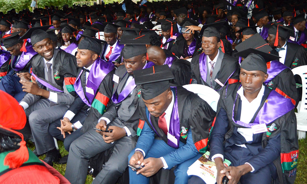 Former Lubaga South MP, Hon. John Ken Lukyamuzi with fellow Bachelor of Laws Graduands on Day 4 of the 69th Graduation Ceremony, 18th January 2019, Freedom Square, Makerere University, Kampala Uganda.