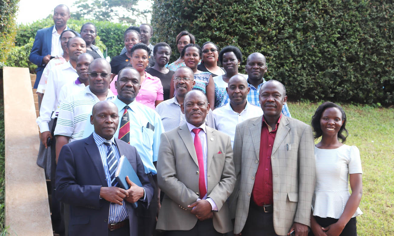 The Vice Chancellor, Prof. Barnabas Nawangwe (2nd Left) and Academic Registrar, Mr. Alfred Masikye Namoah (2nd Right) with the Deputy Registrar (Undergraduate Admissions and Records), Mr. Charles Ssentongo (Left), Principal Public Relations Officer, Ms. Ritah Namisango (Right) and other members of staff from the AR and PR Departments after the interaction on 10th May 2019, Makerere University, Kampala Uganda