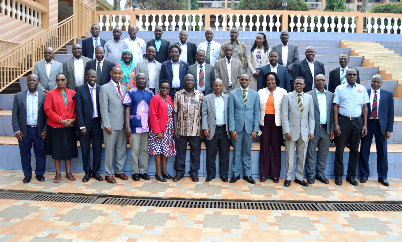 The DVCAA-Dr. Umar Kakumba (6th R), Director DRGT-Prof. Buyinza Mukadasi (4th R) with participants at the Inaugural Deans' Workshop held on 14th June 2019, Hotel Africana, Kampala Uganda