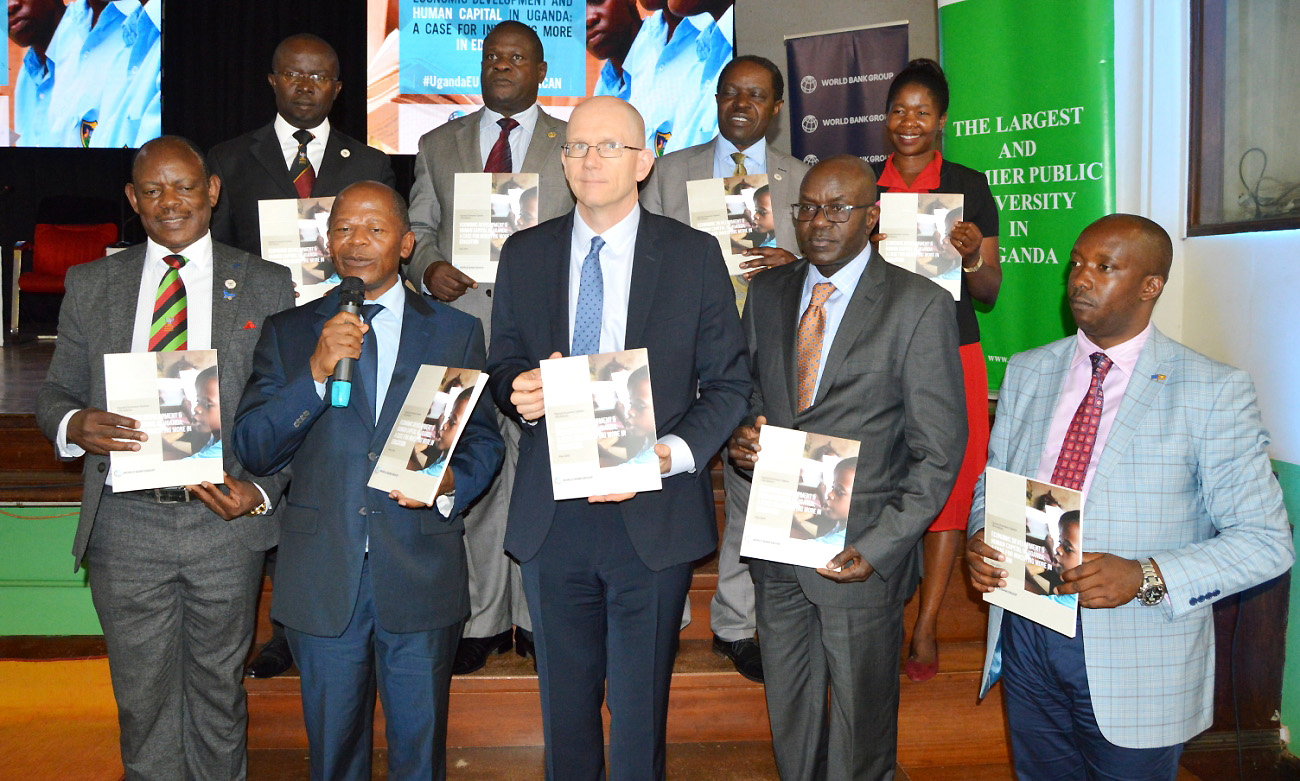 Front Row: Minister of State for Higher Education, Hon. Dr. John Chrysostom Muyingo (Second Left) flanked by the Vice Chancellor  Prof. Barnabas Nawangwe (Left), World Bank Country Manager for Uganda - Mr. Antony Thompson (Centre), PS MoES - Mr. Alex Kakooza (Second Right), Mr. Patrick Kaboyo (Right) and Second Row Left to Right: Dr. Muhammad Kiggundu Musoke, Mr. Patrick Ocailap, DVCFA-Prof. William Bazeyo and Dr. Rovincer Najjuma during the launch ceremony hosted by Makerere University on 30th May 2019