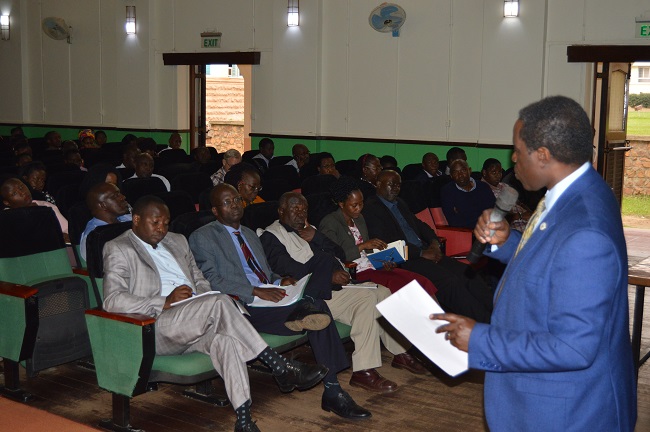 The Chairperson of the Grants Management Committee (GMC) Prof. William Bazeyo addressing management, academic and adminstrative staff as well as students of Makerere University during the sensitization meeting on 23rd August 2019.