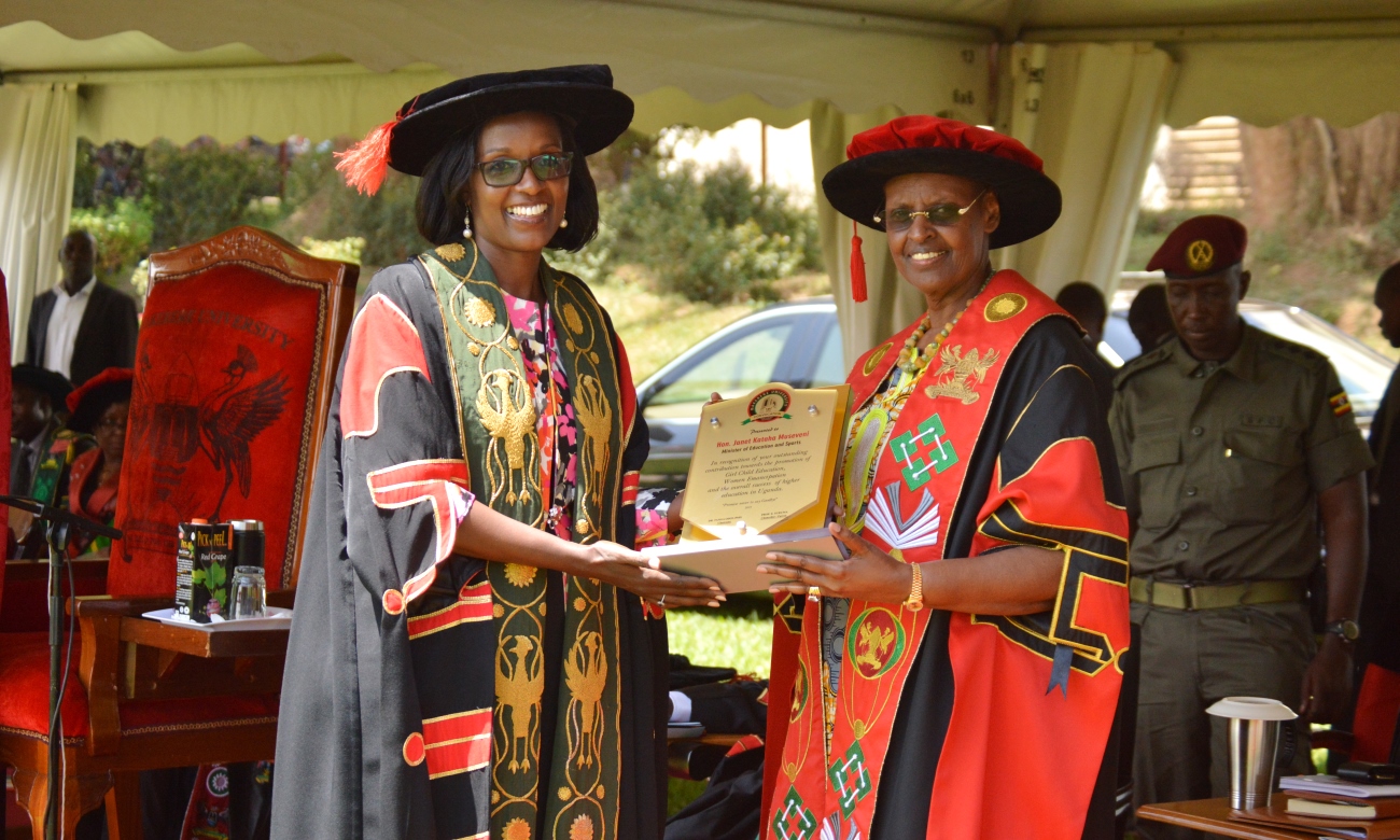 The First Lady and Minister of Education and Sports, Hon. Janet Kataaha Museveni (Right) receives a plaque from the Chairperson Council, Mrs. Lorna Magara (Left) during Day1 of the 69th Graduation Ceremony, 15th January 2019, Makerere University, Kampala Uganda.