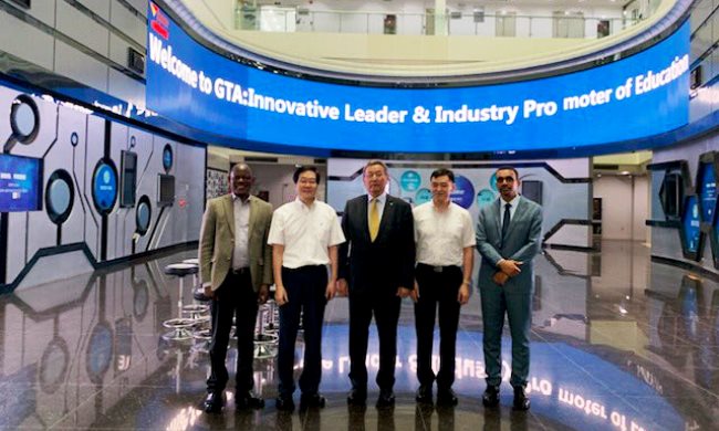The Vice Chancellor, Prof. Barnabas Nawangwe (Left) during his tour of GTA Education and UBTECH companies in on 22nd July 2019, Shenzhen, China.