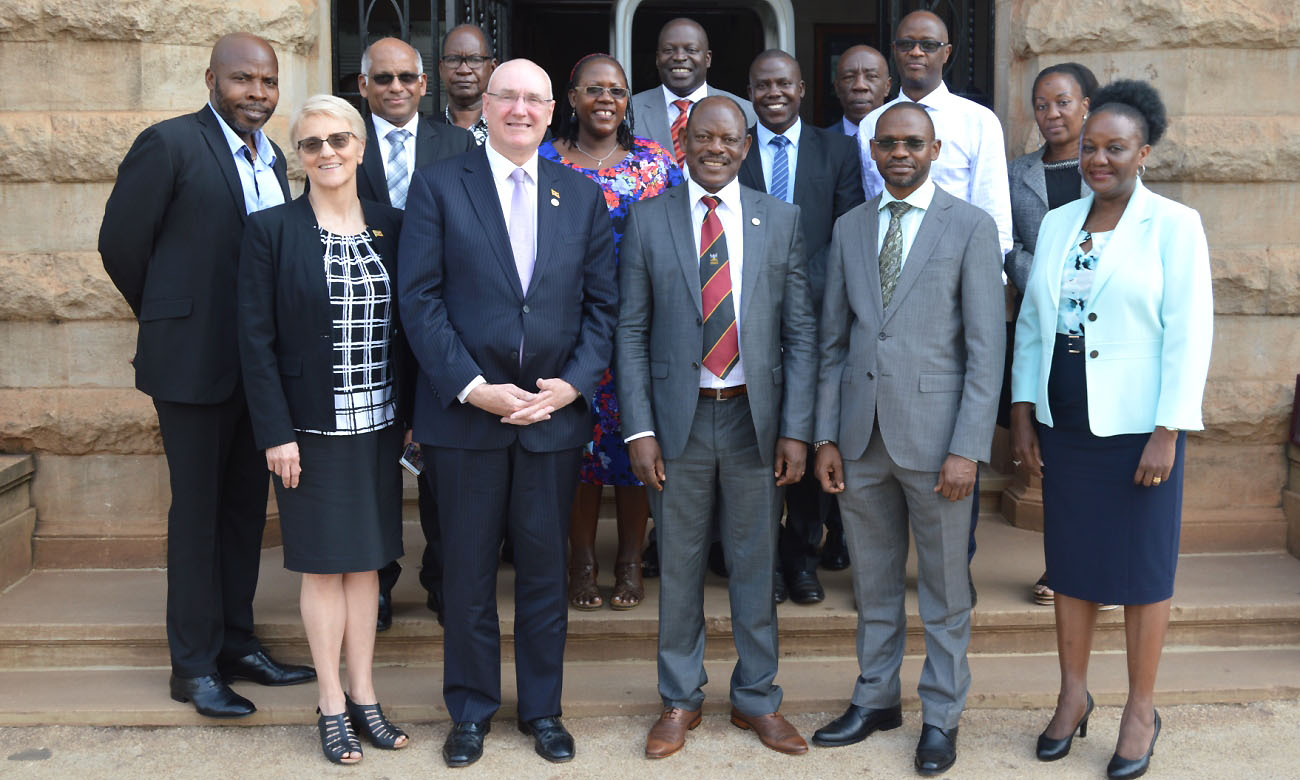 The Vice Chancellor, Prof. Barnabas Nawangwe (Centre) with the Vice Chancellor and President WSU, Prof. Barney Glover (2nd Left) flanked by (Front Row: L-R) Assoc. Prof. Linda Taylor-WSU, DVCAA-Dr. Umar Kakumba and Dean MakSPH-Prof. Rhoda Wanyenze as well as Staff from Mak and WSU after the visit on 1st August 2019, Makerere University, Kampala Uganda