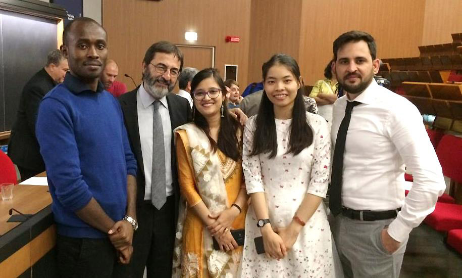Mr. John Bosco Ssebandeke (in blue sweater) with faculty and colleagues shortly after his award as the best performing Diploma Student in Earth System Physics on 29th August 2019, The Abdus Salam International Centre for Theoretical Physics (ICTP), Trieste Italy
