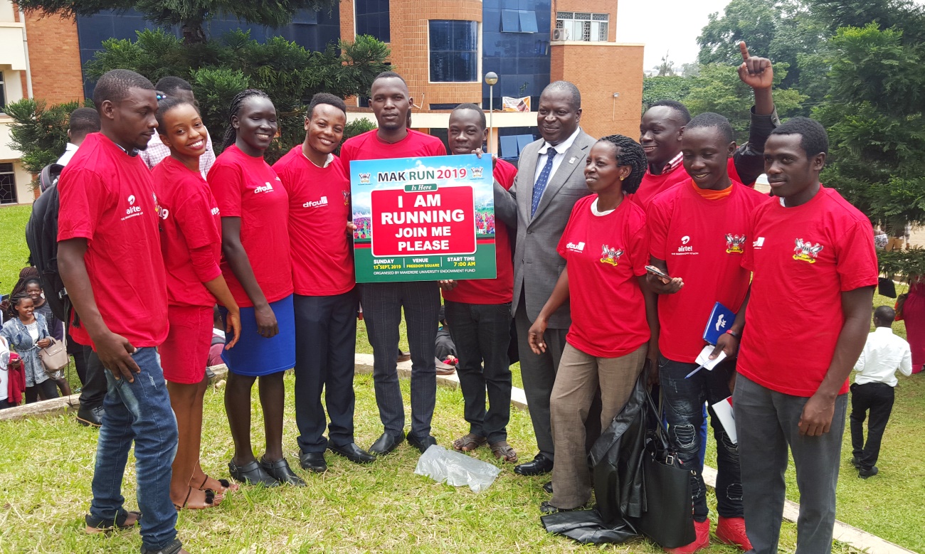 The Principal CoCIS-Prof. Tonny Oyana poses with some of the 100 students due to take part in #MakRun2019, 15th September 2019, Makerere University, Kampala Uganda
