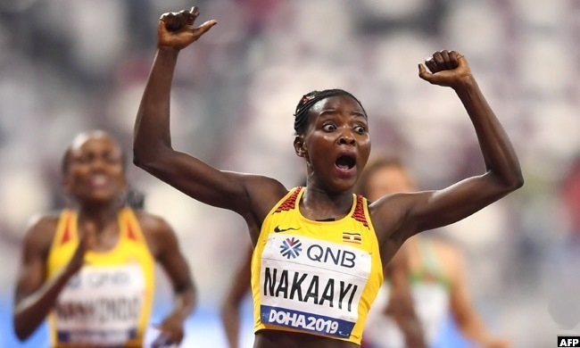Halima Nakaayi reacts after crossing the finishing line in the IAAF Women's 800m final in Doha on Monday 30th September 2019. Halima set a new national record of 1:58.04 ahead of American duo Raevyn Rogers (Silver) and Ajee Wilson (Bronze). Photo Credit:AFP/New Vision