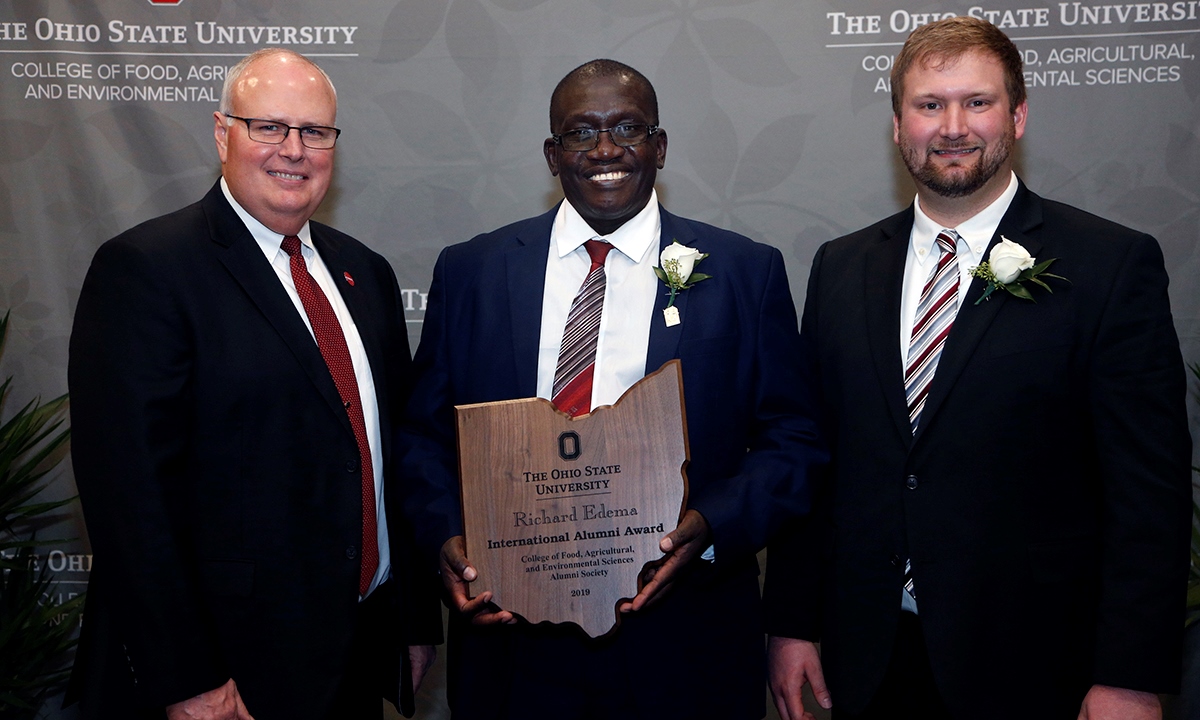 Dr. Richard Edema (Centre) flanked by Associate Dean and Director of Academic Programs Steven Neal (Left) and President CFAES Alumni Society, Nick Retting (Right) at the Award Ceremony on 2nd March 2019 at the Fawcett Center, Ohio State University Columbus Campus. Photo credit: CFAES, Ohio State