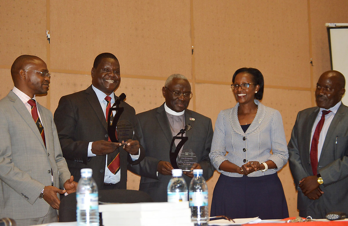 The Chairperson Council-Mrs. Lorna Magara (2nd Right) poses with L-R: DVCAA-Dr. Umar Kakumba, Dr. David Onen, Rev. Canon Dr. John Senyonyi and Principal CEES-Prof. Fred Masagazi Masaazi shortly after presenting Dr. Senyonyi and Dr. Onen with plaques following the 2nd Prof. William Senteza Kajubi Memorial Lecture, 14th November 2019, CTF 2, Makerere University, Kampala Uganda.